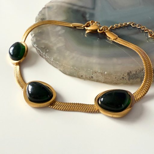 nemesacél karkötő 18 karátos arany bevonattal és zöld üveggel díszítve
