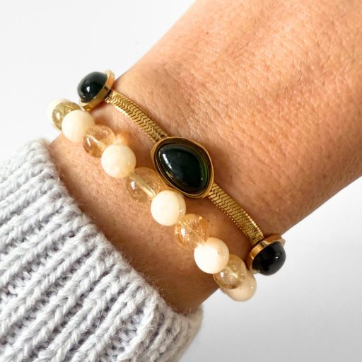 nemesacél karkötő 18 karátos arany bevonattal és zöld üveggel díszítve